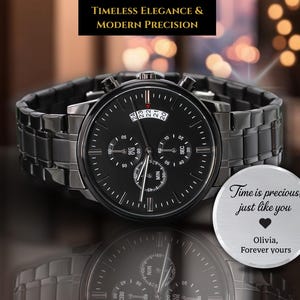 May include: A black wristwatch with a black strap. The watch face features subdials and a date display. The text "TIMELESS ELEGANCE & MODERN PRECISION" is at the top. A small, round, silver disc with text is on the right.
