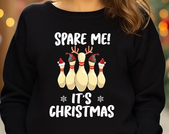May include: Black sweatshirt with a white graphic of bowling pins wearing Santa hats and the text "Spare Me! It's Christmas".