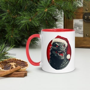 Taza de café navideña Godzilla - Diseño de dibujos animados caprichoso - Taza de té de cerámica colorida - Regalo festivo divertido - Bebidas únicas con temática de monstruos