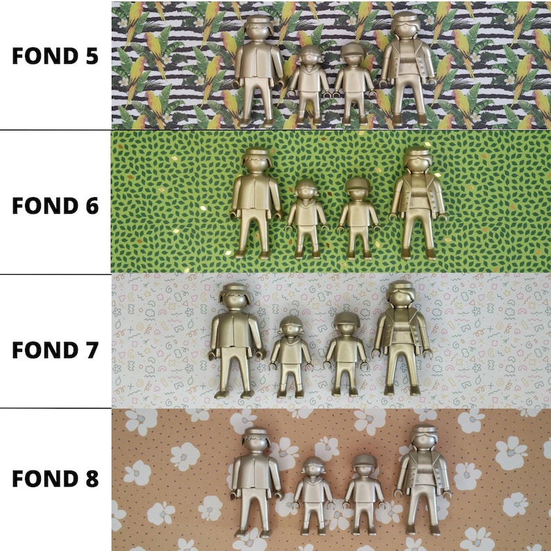May include: Four gold-colored plastic figures arranged in a family group, consisting of two adults and two children, displayed against four distinct patterned backgrounds labeled FOND 5, FOND 6, FOND 7, and FOND 8, featuring tropical, leaf, geometric, and floral prints.