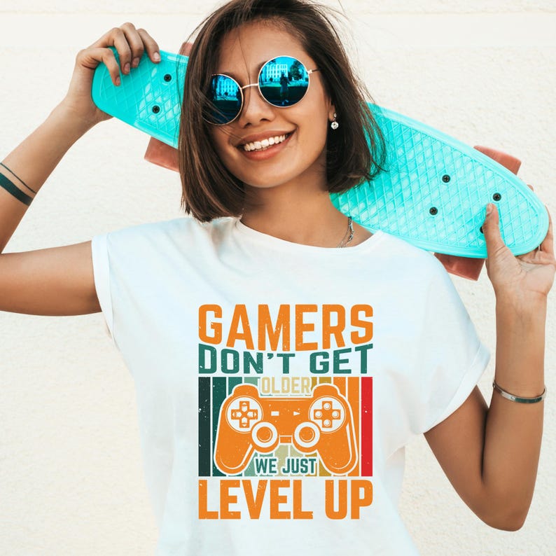 A girl is wearing a gaming typography T-shirt, featuring a stylish and fun design perfect for gamer girls and streamers