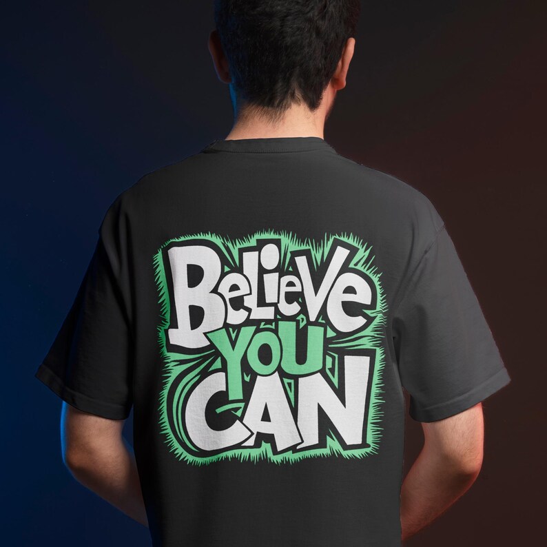 Backside view of a T-shirt mockup featuring a motivational design, highlighting unique placement for inspiring apparel.