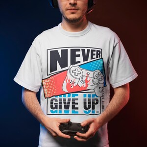 Close-up of a gaming-themed design on a white t-shirt, ideal for esports fans and gaming enthusiasts.