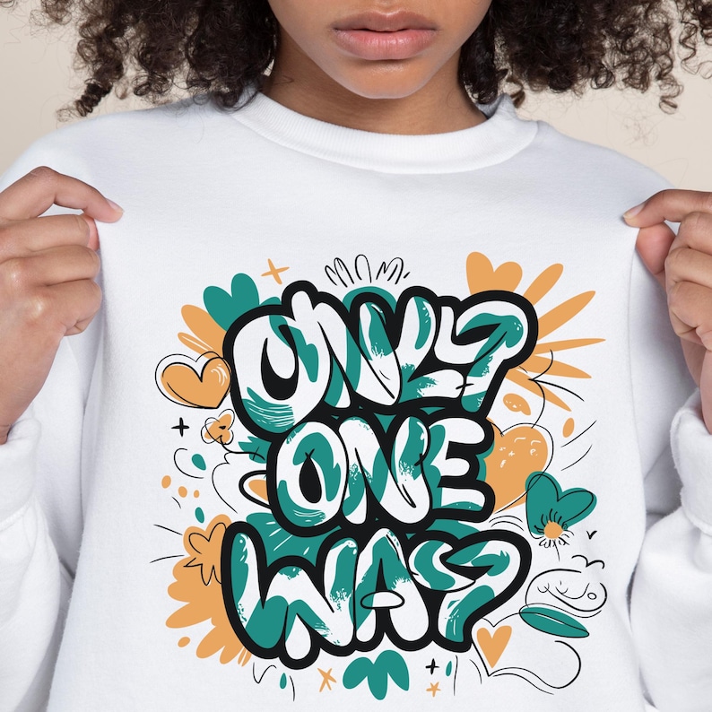 May include: White sweatshirt with a green and orange graphic print that says "Only One Way".