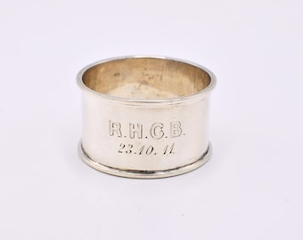 Antieke sterlingzilveren servetring met 'RHCB 23.10.11'-gravure