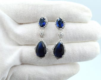 Saphir-blaue und weiße Zirkonia Sterlingsilber 925 Ohrringe - Funkelnde Birnen-geschliffene Kristallohrringe, Imitationssaphir und -diamant