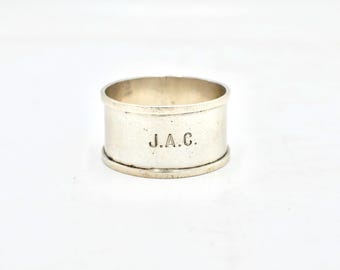 Sterlingzilveren servetring met gravure: J.A.C.