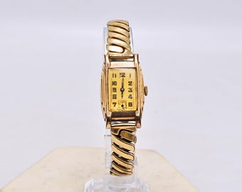 Reloj vintage chapado en oro rosa Unisex, no funcional, años 40