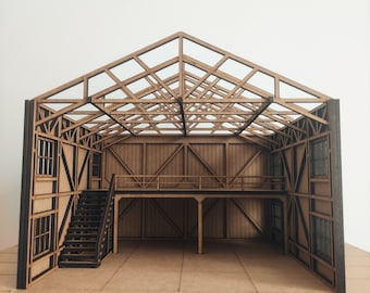 May include: A wooden model of a building with a gabled roof and a second floor. The model has a staircase leading up to the second floor and windows on the sides.