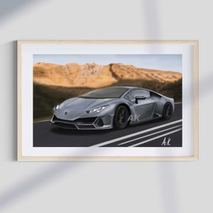 May include: A gray Lamborghini sports car driving on a road with a desert mountain range in the background. The car has black wheels and a black interior. The car is driving on a road with white lines.