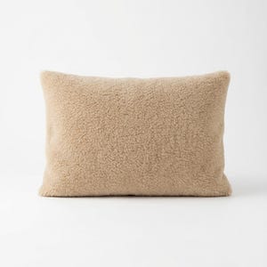 May include: A set of three ceramic mugs with a speckled, matte finish. Each mug features a different color: light blue, cream, and gray. The mugs have a simple, modern design and a comfortable handle.