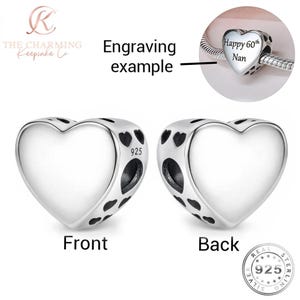 May include: Two sterling silver heart-shaped charms. One charm is labeled "Front" and the other "Back". The charms have a smooth heart shape with a decorative pattern of small hearts. The text "925" is visible on the side of the charm. An example shows the charm engraved with "Happy 60th Nan".