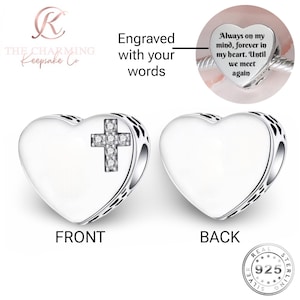 May include: A heart-shaped charm with a cross design on the front and a blank back. The charm is silver-colored and has the text "FRONT" and "BACK" on the image. The charm is engraved with the words "Engraved with your words".