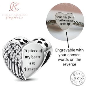 Può includere: Un charm a forma di cuore in argento con un design ad ala e l'iscrizione "A piece of my heart is in Heaven". Il charm ha un ciondolo a forma di cuore con il testo "Dad, My Hero Until we meet again". Il charm è incisibile.