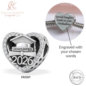 May include: A sterling silver heart-shaped charm with a graduation theme. The charm features a graduation cap, scroll, and the year 2026. The charm is engraved with the words "Graduated" and "2026". The charm is surrounded by clear crystals.