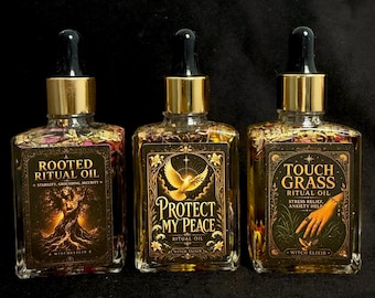 May include: Three clear glass dropper bottles with gold caps, each containing oil and dried botanicals. The labels read Rooted Ritual Oil, Protect My Peace, and Touch Grass Ritual Oil, featuring detailed illustrations of a tree figure, a dove, and a hand.
