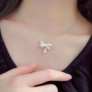 Lab Grown Pear Diamond Necklace: Rose Gold Bow Pendant