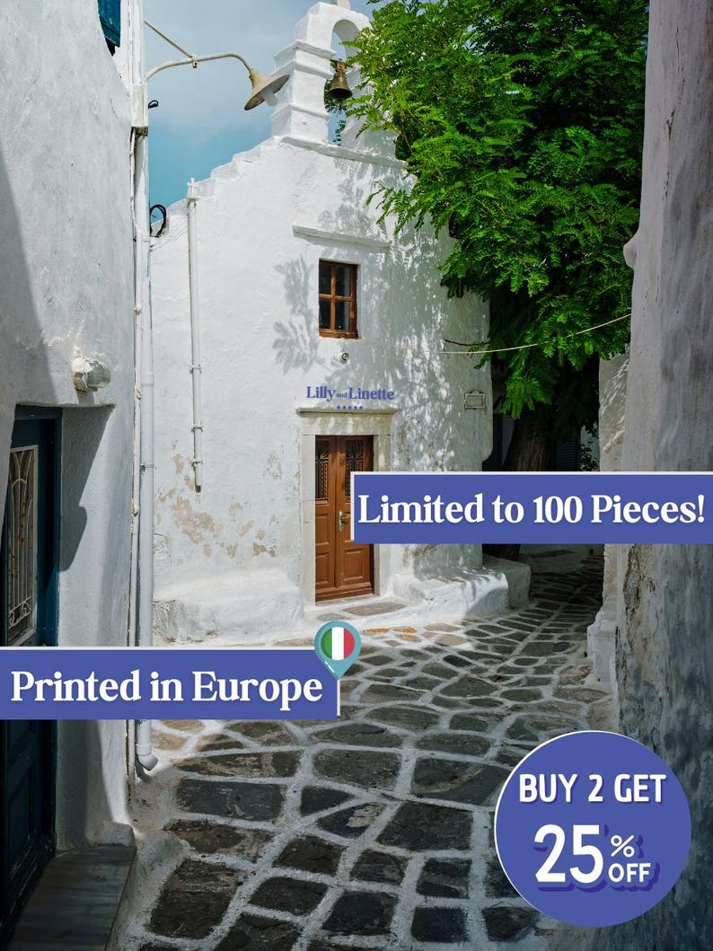 May include: A white building with a brown door and a bell tower. The building is located in a narrow alleyway with a cobblestone floor. The text "Limited to 100 Pieces!" is visible in the image. The text "Printed in Europe" is also visible in the image. The image is a photograph of a building in a European city.