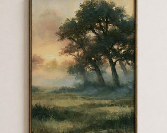 Op de afbeelding: Een ingelijst landschapsschilderij met een grasveld en donkergroene bomen onder een zachte, wazige lucht. De scène bevat gedempte tinten olijfgroen, bruin en lichtgeel, met een zachte mist die zich bij de bomen in de verte bevindt.