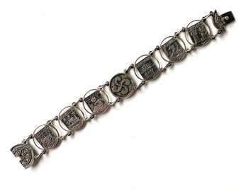 Vintage French Souvenir bracelet depicting coastal towns in South West France