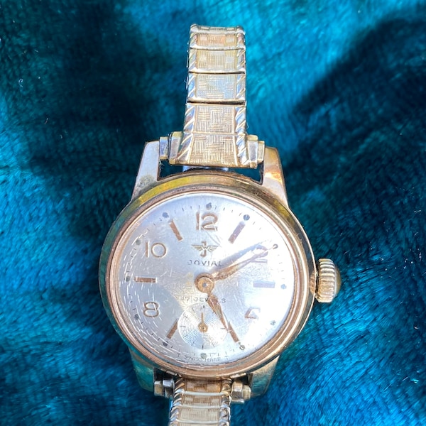 Vintage Jovial Ladies watch - second-hand, stretch metal wristband  and 17 jewels. Fully working. Gold plate. Swiss mechanics. Speidel, USA