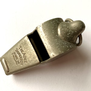 Vintage Acme Thunderer Whistle with tapered end and tooth grip