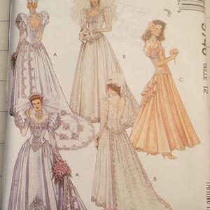 Vintage McCalls pattern 5746 dropped waist long sleeved wedding gown with train or bridesmaid size 12 out of print factory folded uncut
