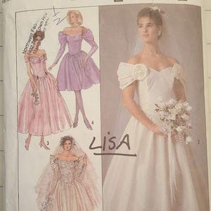 May include: Simplicity sewing pattern featuring illustrations of wedding dresses. The pattern includes a variety of bridal gown designs, including off-the-shoulder styles and gowns with long sleeves. The word "LISA" is written on the pattern.
