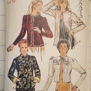 May include: Vintage Butterick sewing pattern, size 12, featuring illustrations of four different jacket designs. The jackets include a burgundy velvet jacket, a quilted jacket, a black and gold floral jacket, and a striped jacket.
