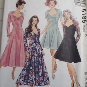 May include: McCall's sewing pattern 6185 featuring illustrations of four different dress designs. The pattern includes a long-sleeved floral dress, a pink dress, a short-sleeved blue dress, and a black dress with a patterned jacket. Size 10.