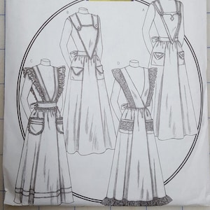 May include: A Butterick sewing pattern envelope, featuring illustrations of historical dresses. The envelope displays the number 4042 and the word "Butterick" in bold text. The design includes multiple dress variations with detailed drawings.