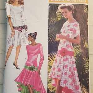 May include: Vintage Butterick sewing pattern featuring illustrations of three different dresses. The dresses are in shades of pink, white, and green. The pattern includes the sewing rating "AVERAGE".