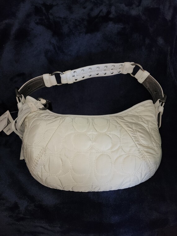 coach signature quilted Gem