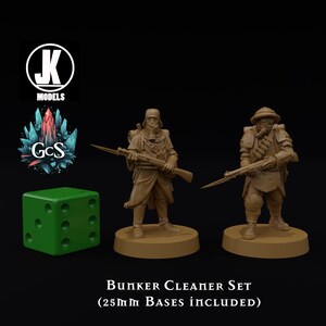 May include: A set of two miniature figures of soldiers in tan uniforms, holding rifles. The figures stand on circular bases. A green die and a logo with the text "JK MODELS" and "GcS" are also visible. The text "Bunker Cleaner Set (25mm Bases Included)" is at the bottom.