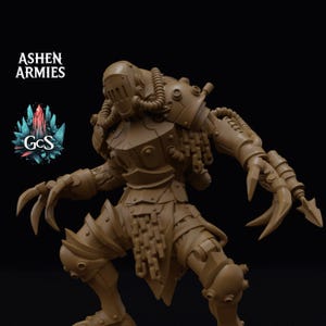 May include: A tan-colored miniature figurine of a mechanical warrior with a helmet, tubing, and clawed hands. The figure features a chain-link loincloth and armor plating. The text ASHEN ARMIES and GCS with a crystal graphic appear in the corner.