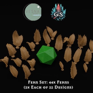 May include: A set of 44 brown plastic fern miniatures, each with a unique design. The ferns are arranged around a green 20-sided die. The text "FERN SET: 44x FERNS (2x EACH OF 22 DESIGNS)" is printed below the ferns.