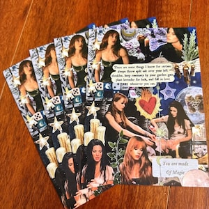 May include: A stack of art prints featuring images of women, candles, stars, and text. The prints have a collage style with a mystical theme. Text includes "You are made of Magic" and a quote about luck.