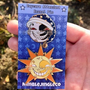 Smiling Sun And Moon Enamel Pin