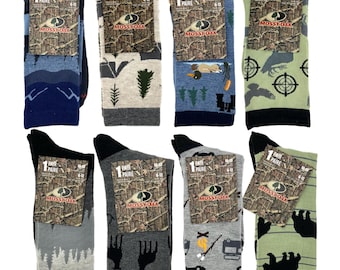 May include: Eight pairs of men's socks with different camouflage patterns. The socks are all Mossy Oak brand and feature various hunting-themed designs, including deer, ducks, and trees. The socks are all size 6-12.
