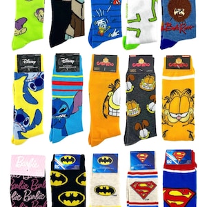 May include: Assorted crew socks featuring various cartoon characters, including Disney's Stitch, Mickey Mouse, and Garfield. Other socks display Star Wars' Grogu, Bob Ross, and DC Comics' Superman and Batman. Sizes 9-13.