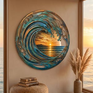 May include: A circular wall art piece featuring a stylized, cut-out metal wave frame in shades of teal, blue, and bronze. The center of the frame displays a printed image of a sunset over the ocean with a bright sun on the horizon.