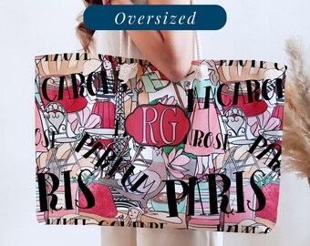 May include: Oversized tote bag with a colorful Parisian-themed print. The design features illustrations of cafes, people, and the Eiffel Tower, with the word "Paris" prominently displayed. The bag has a large capacity.