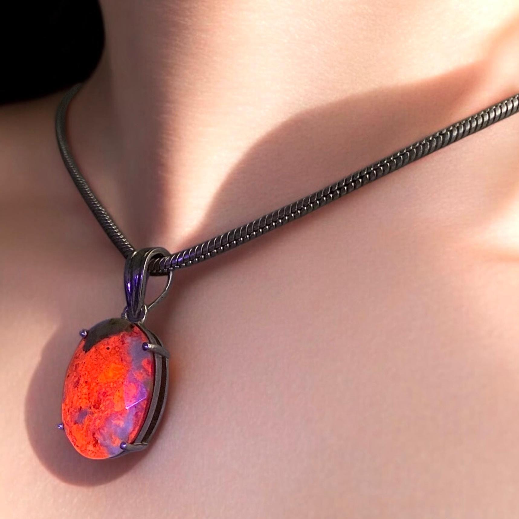 Tugtupite Pendant – Natural Oval Gemstone from Greenland | 925 Silver | Fluorescent Orange Glow | Free Worldwide Shipping