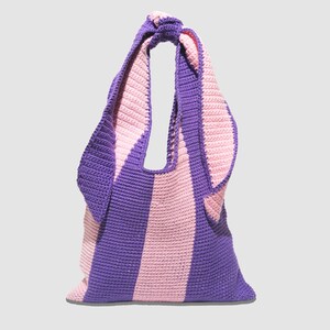 May include: A purple and pink striped crocheted tote bag with a knotted handle.