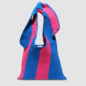 May include: A blue and pink striped crocheted tote bag with a knotted handle.