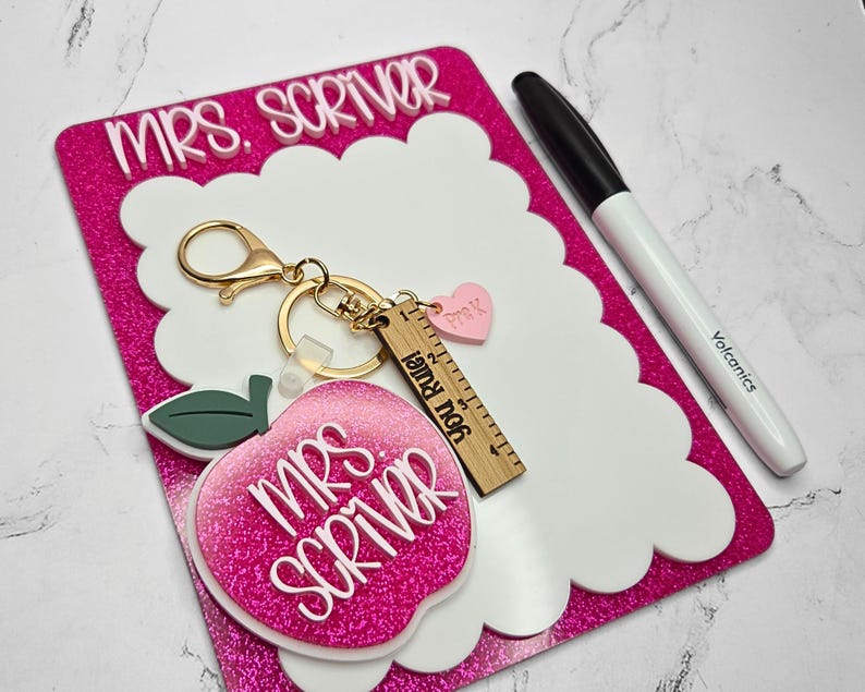 Custom teacher desk whiteboard notepad with personalized name and scalloped edges. Reusable dry erase board perfect for classroom reminders, daily teacher notes, and lesson planning lists. Great teacher appreciation gift, new teacher classroom accessory, and back to school teacher gift idea.