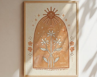 May include: A digital art print featuring a stylized sun with a face and rays, surrounded by a brown arch with white flowers and stars. The background is a light brown watercolor wash.
