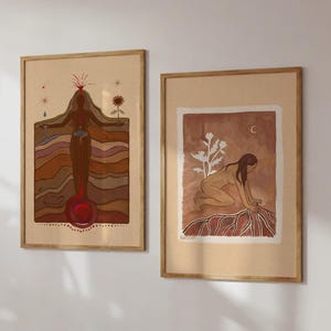 May include: Two framed illustrations of women in a minimalist style. The first illustration depicts a woman standing with her arms outstretched, surrounded by layers of earth tones. The second illustration shows a woman kneeling, reaching towards a plant with white flowers. Both illustrations have a muted colour palette with shades of brown, red, and white.