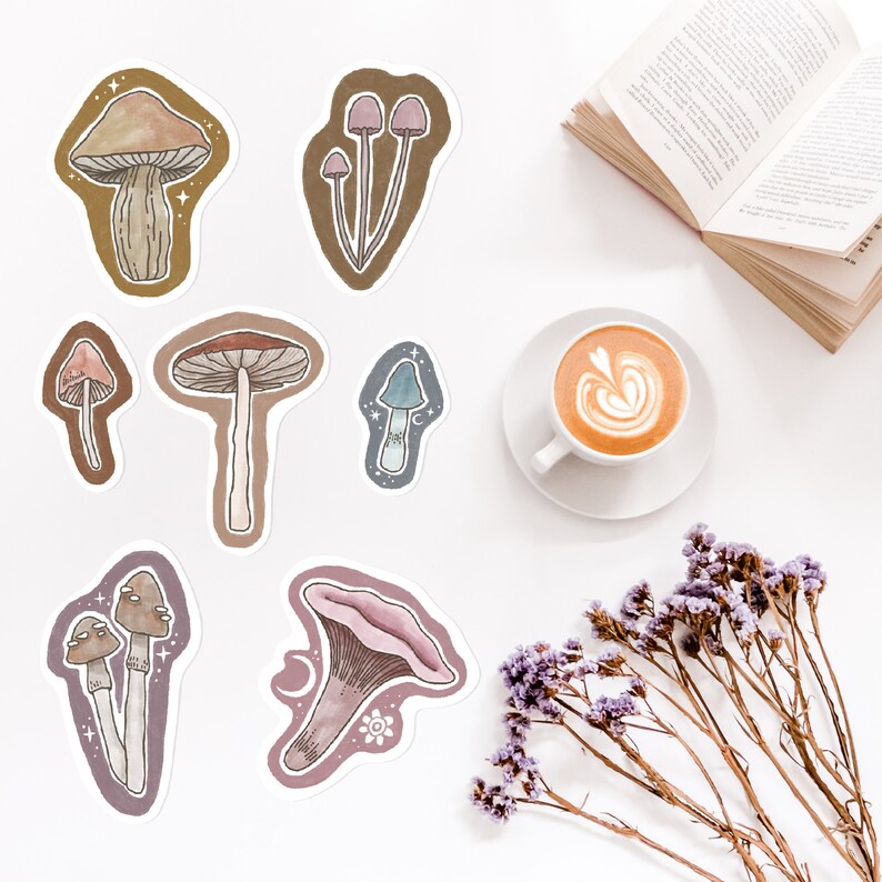 May include: A set of nine mushroom stickers with various colours and designs. The stickers are on a white background.