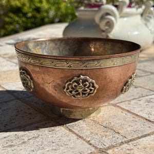 Tibetan copper and brass offering bowl, vintage